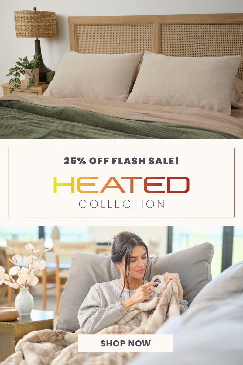 25% off flash sale on our heated collection. featuring a cozy bedroom with a green heated blanket on the bed and a woman sitting on a sofa pressing a button on a heated throw. 