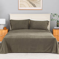 All-Season Microfleece Sheet Set in Kalamata on a made bed with a cream headboard, front view