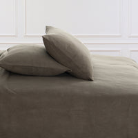 All-Season Microfleece Sheet Set pillowcases in Kalamata on a made bed against a white paneled wall