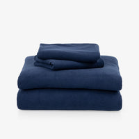All-Season Microfleece Sheet Set in Navy, folded on a white background