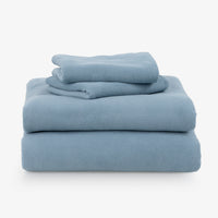 All-Season Microfleece Sheet Set in Slate Blue, folded on a white background