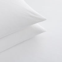Close-up of All-Season Microfleece Sheet Set pillowcases in True White