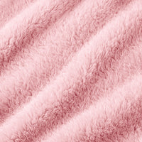 A close-up of soft, plush pink faux fur or sherpa fabric with diagonal folds showing the textured pile.