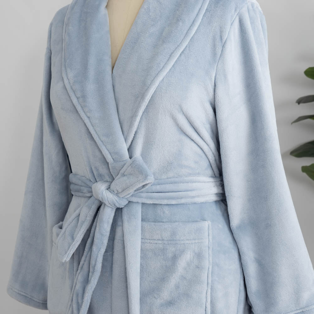 A light blue VelvetLoft Robe on a mannequin with a belt neatly tied around the waist.