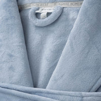 A close-up showing the plush texture of a light blue VelvetLoft Robe.