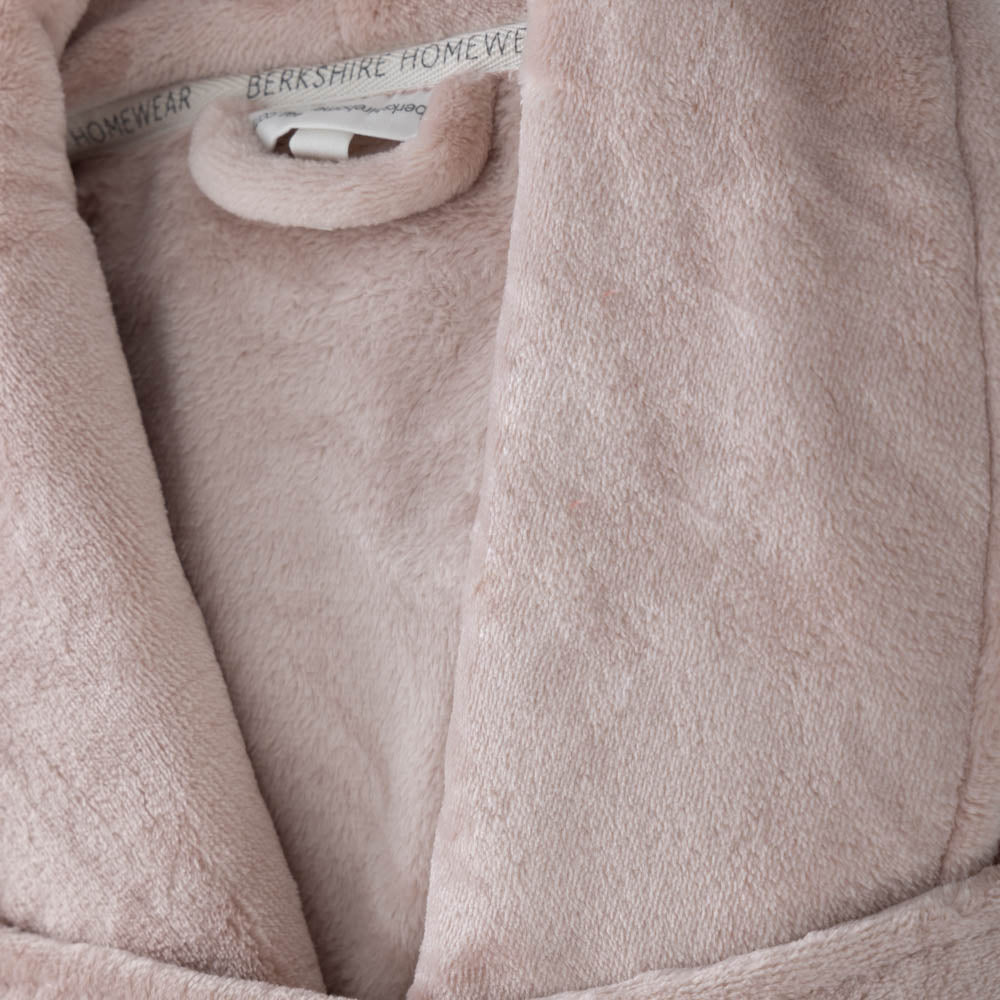 A close-up showing the plush texture of a pink VelvetLoft Robe.
