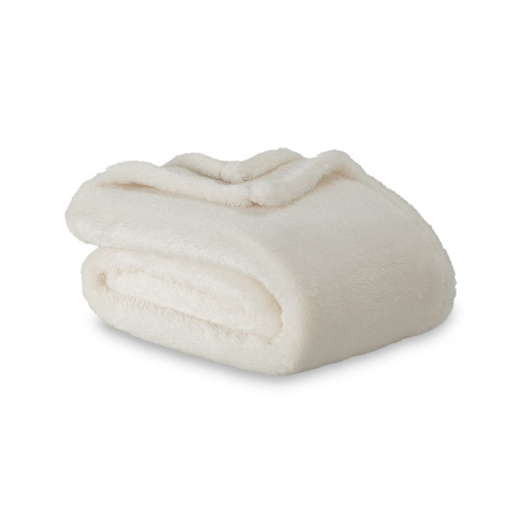 Folded white blanket on a white background