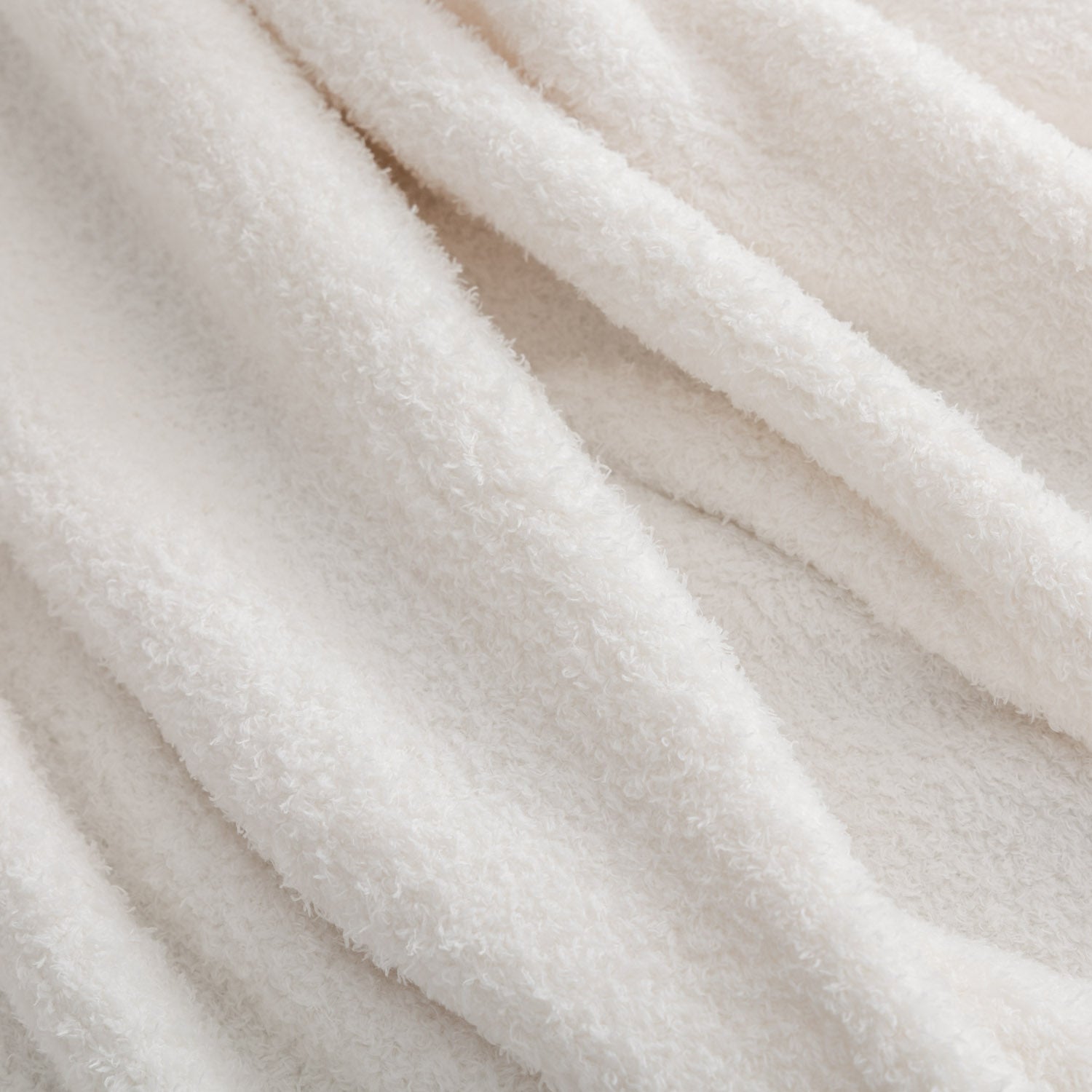 Close-up of soft, beige fabric texture