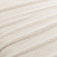 Close-up of beige fabric texture
