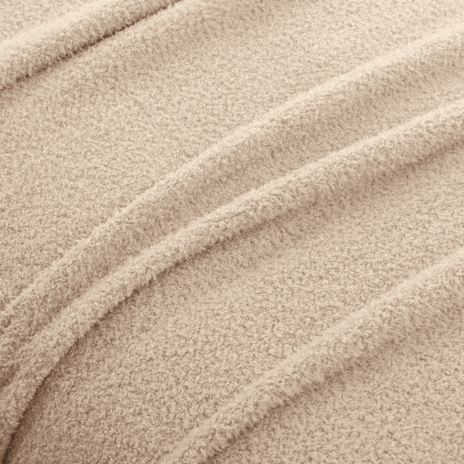 Close-up of beige fabric with visible texture