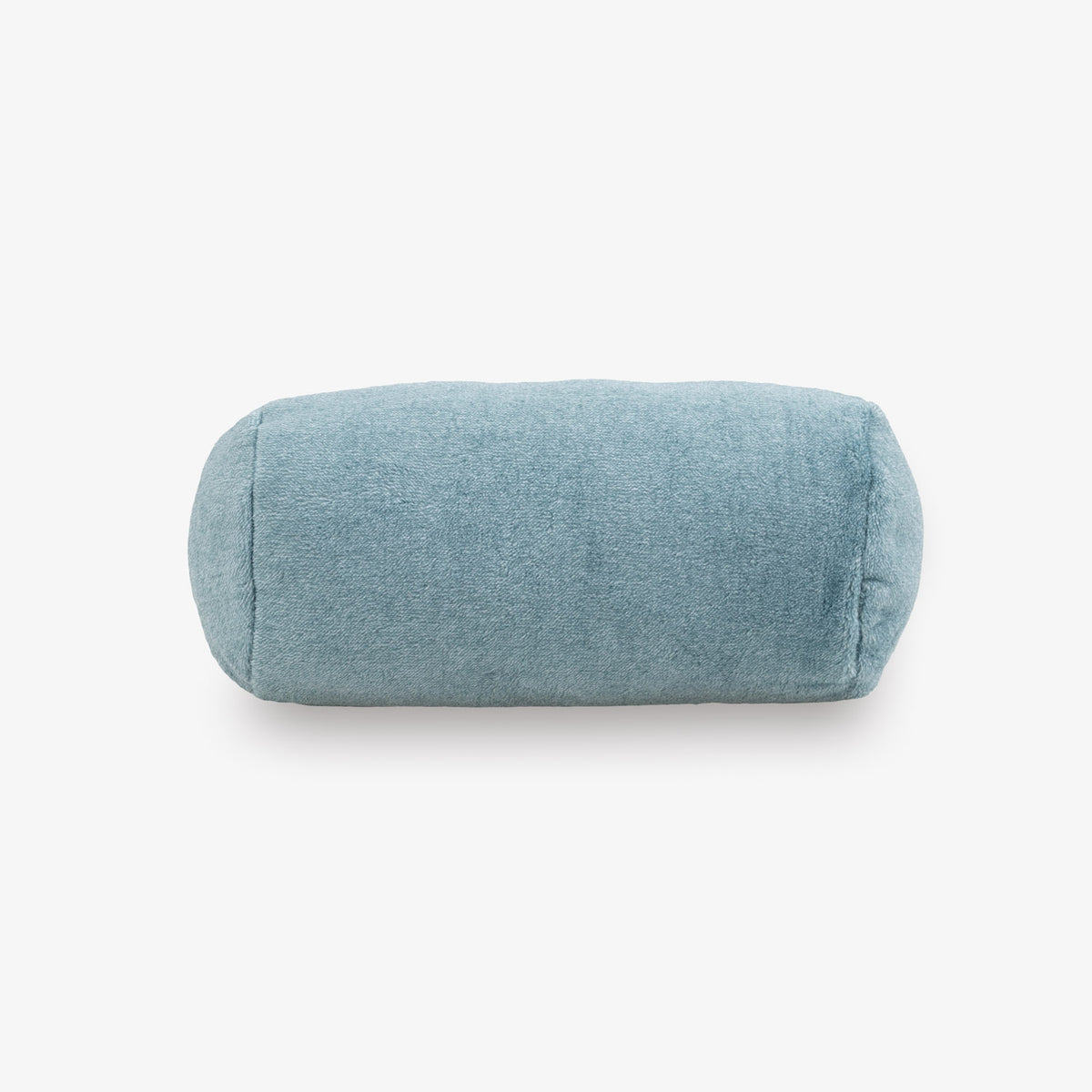 Blue cylindrical pillow on a white background