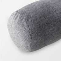 A close up of a grey EcoThread Neckroll Pillow, displaying its soft and plush texture.