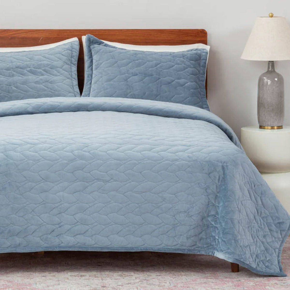 VelvetLoft® Quilt Set in Polar Blue on a made bed, front view