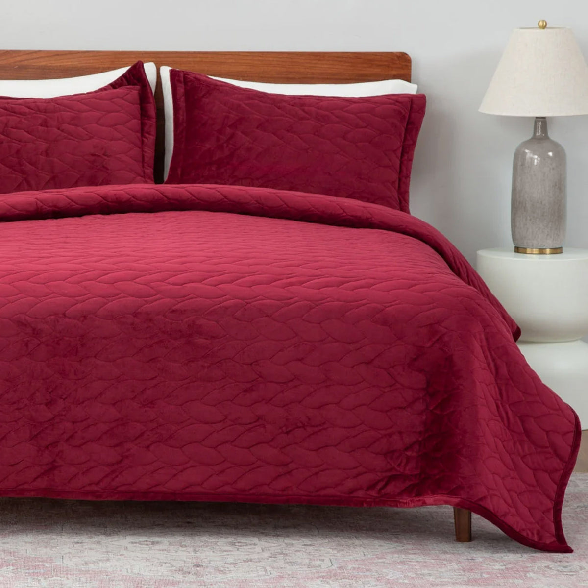 VelvetLoft® Quilt Set in Windsor Wine on a made bed, front view