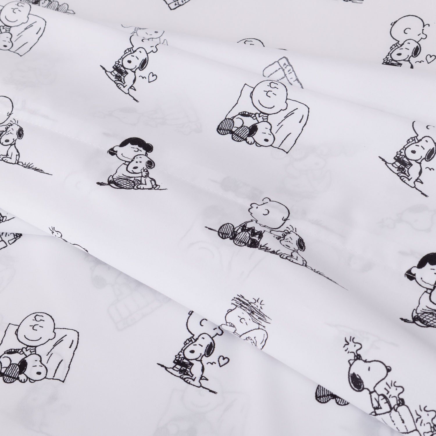 Close up of a Peanuts printed microfiber sheet set.
