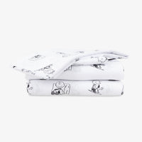 Peanuts printed microfiber sheet set folded neatly on a white surface.