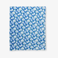 Krissy Mast Artist Series printed hydrangea print throw laid flat on a white surface.