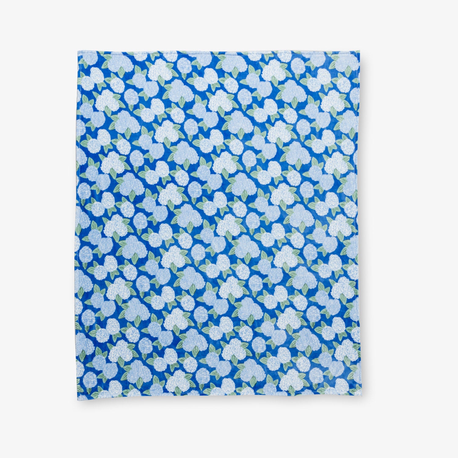 Krissy Mast Artist Series printed hydrangea print throw laid flat on a white surface.
