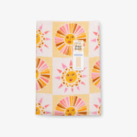 Vicky Yorke Summer Nostalgia beach towel folded neatly on a white surface.