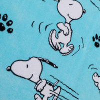 Close up of a blue Peanuts beach towel.