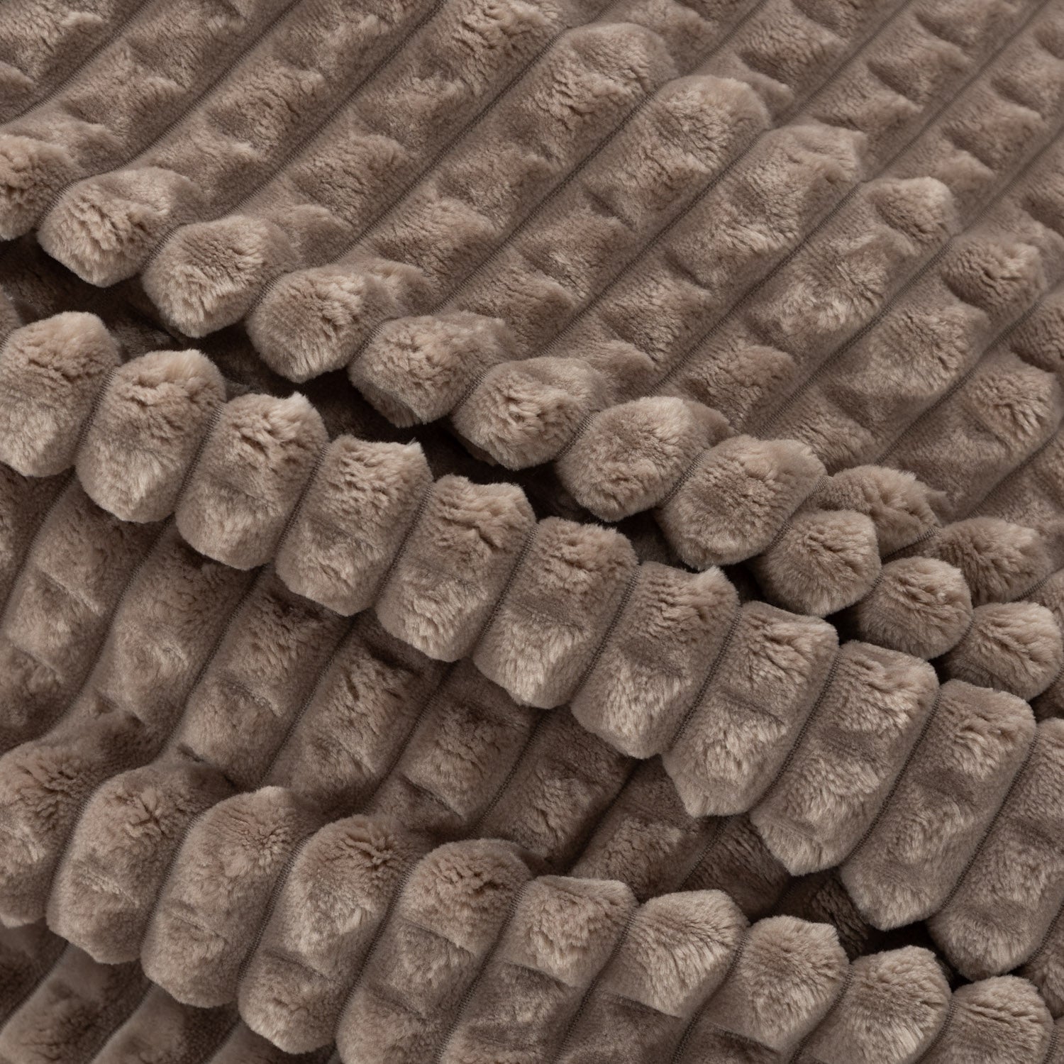 A close up of a brown VelvetLoft waffle blanket.