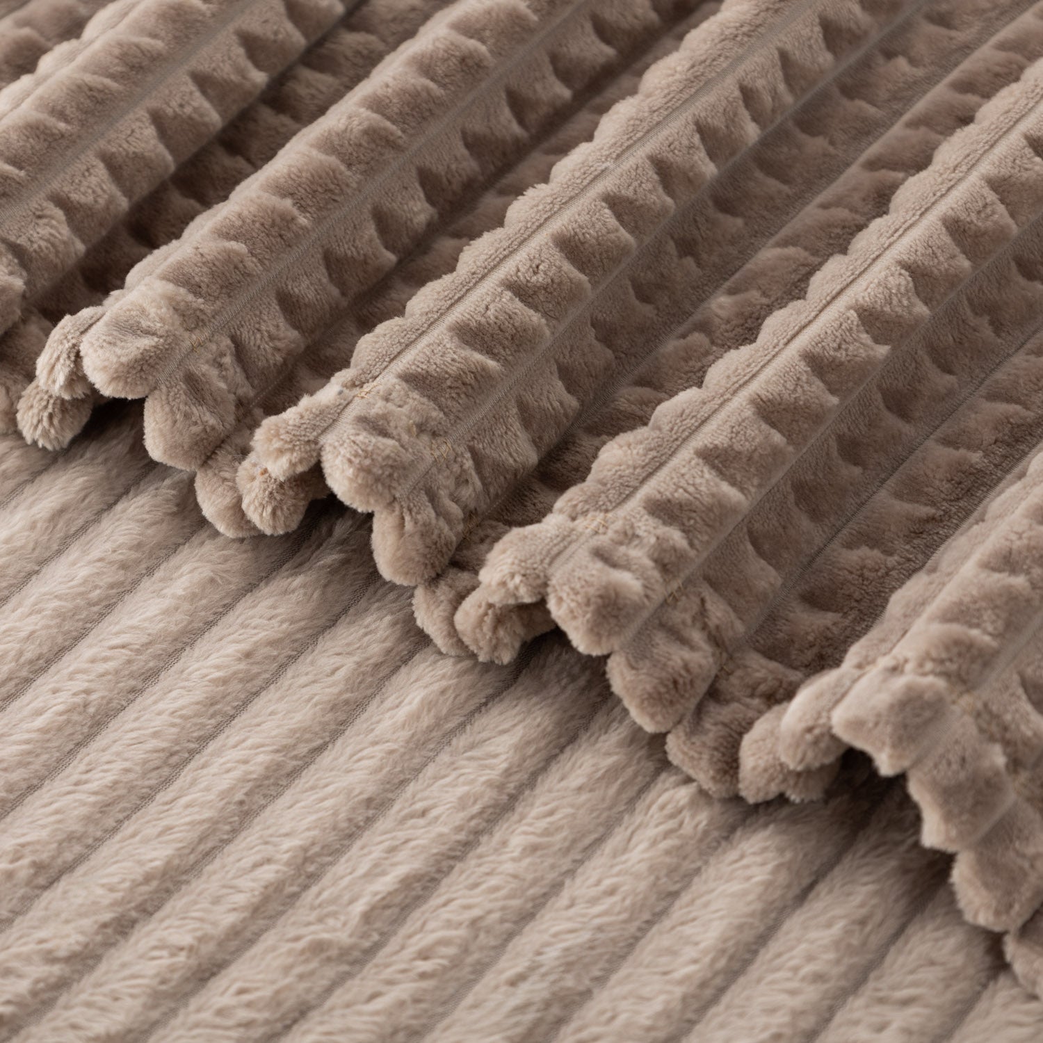 A close up of a brownVelvetLoft waffle blanket.