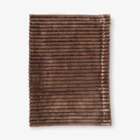 Brown textured throw on a white background