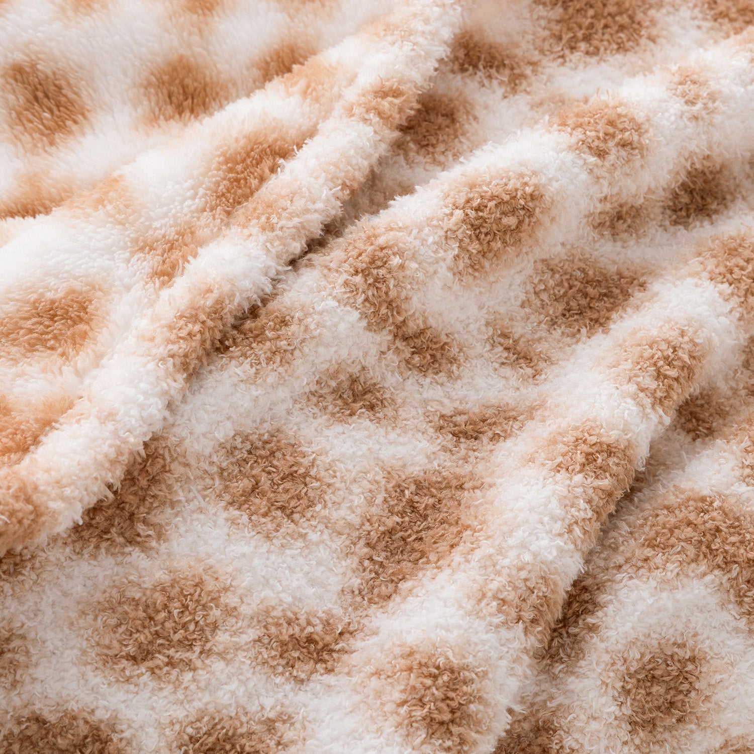 Close-up of a safari-patterned surface with brown and white colors.