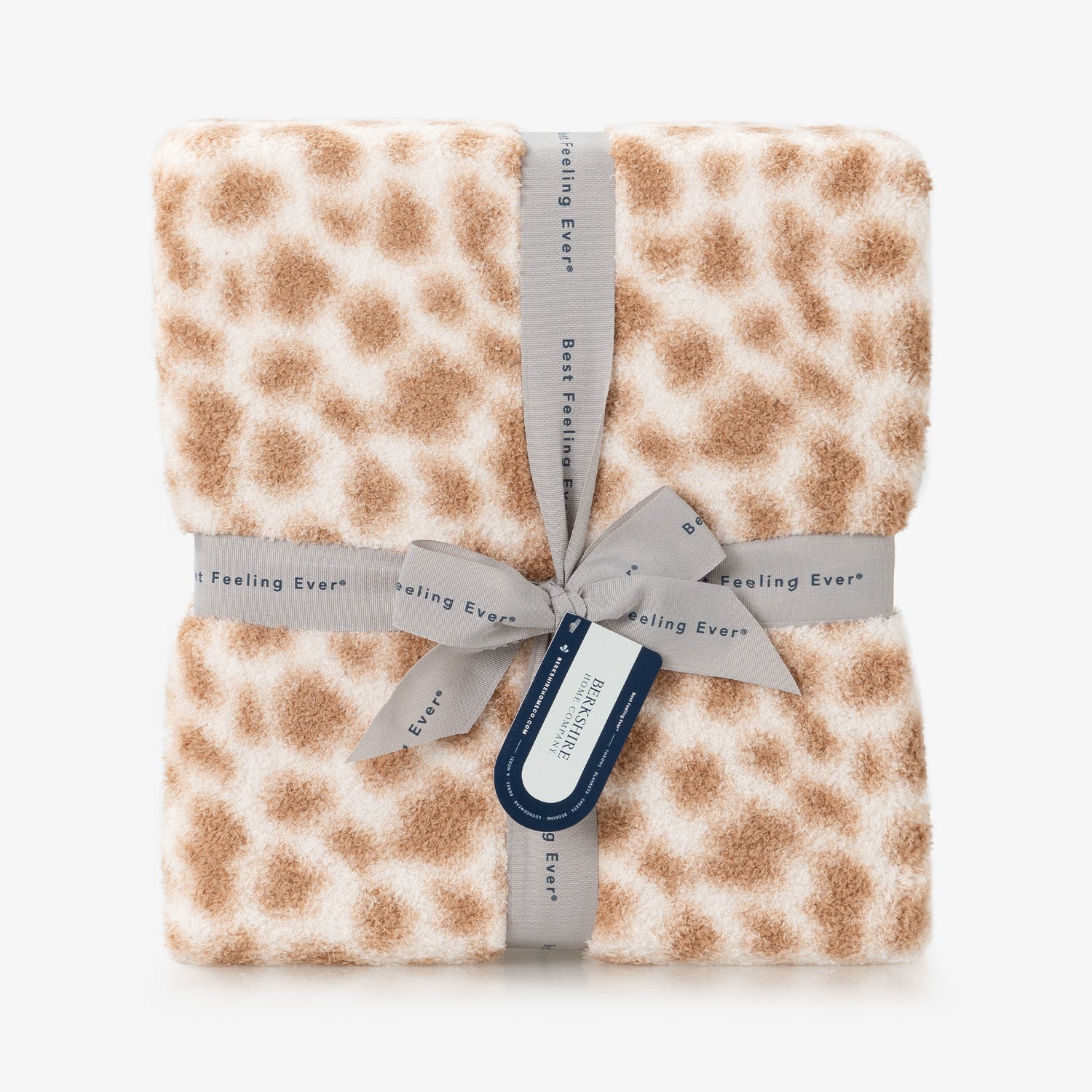 Cheetah print blanket with a gray ribbon and tag on a white background