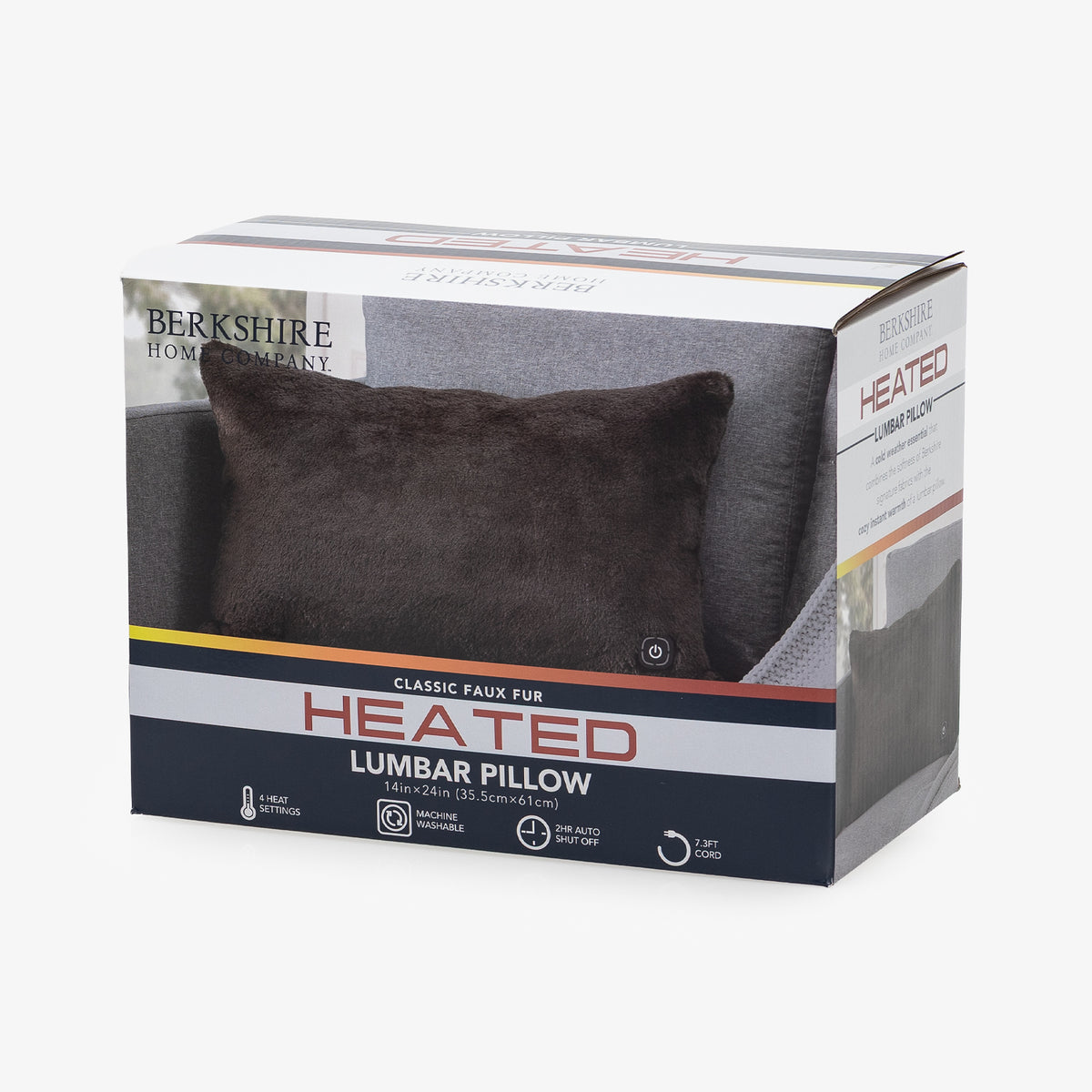 A brown classic heated faux fur lumbar pillow in its Berkshire Home Company branded packaging box.