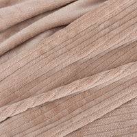 A close-up of a soft, ribbed fabric in a warm taupe-beige color, showing the plush terry texture and stitched channel construction.