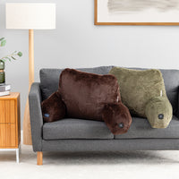 Two plush backrest pillows resting on a gray sofa in a modern living room setting.