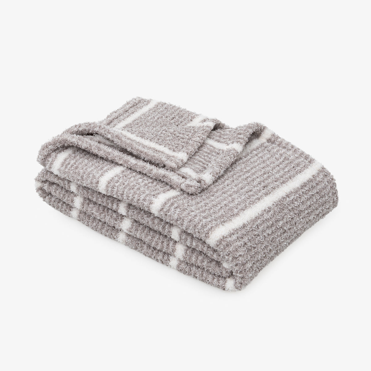 A folded gray knit blanket with white stripes, displayed on a clean white background.