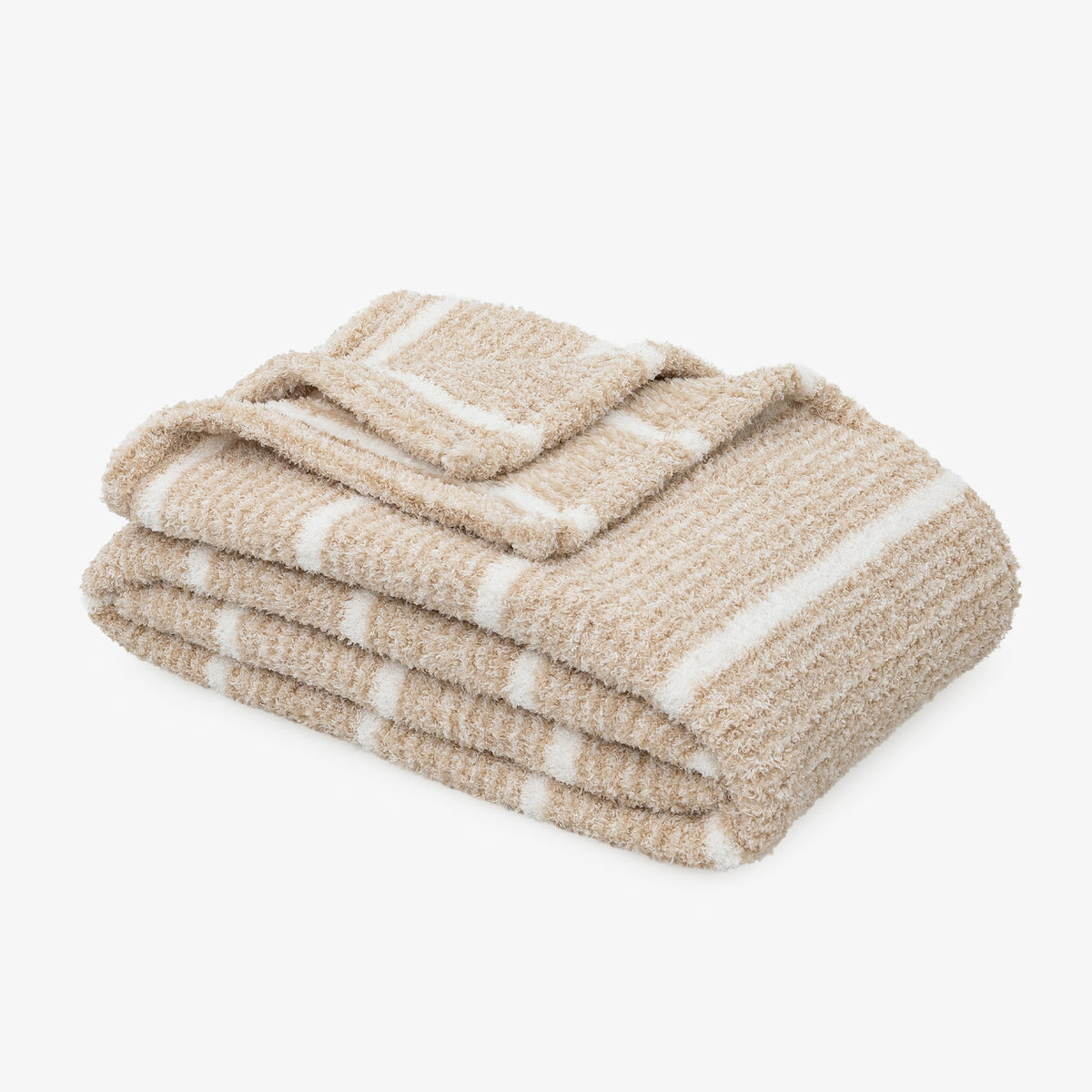 A folded textured throw blanket in a warm beige color with white stripes, shown on a clean white background.