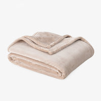 Premium VelvetLoft® Throw in Hummus, folded on a white background