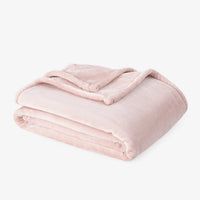 Premium VelvetLoft® Throw in Rose Smoke, folded on a white background