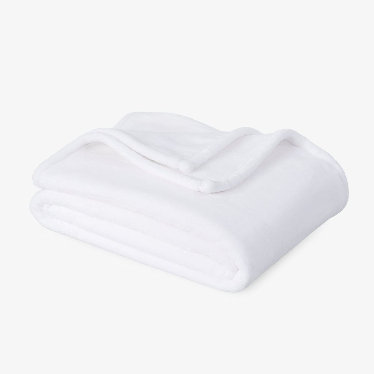 Premium VelvetLoft® Throw in True White, folded on a white background