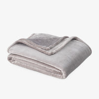 Premium VelvetLoft® Throw in Wild Dove, folded on a white background
