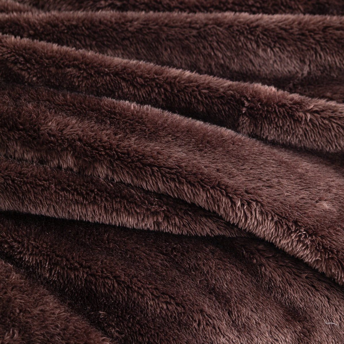 Close-up of Premium Extra-Fluffy™ high-pile plush in Coffee Brown