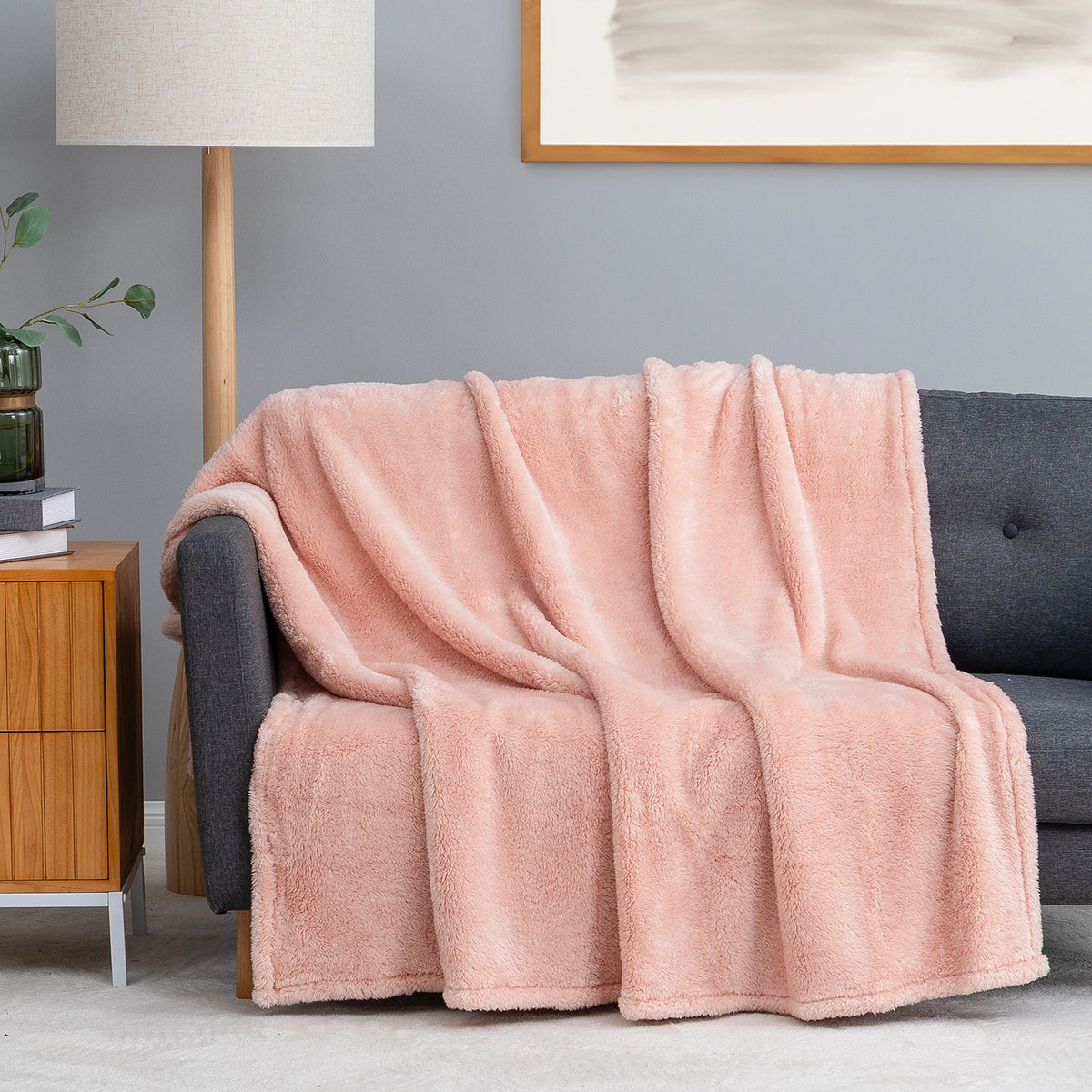 Premium Extra-Fluffy™ Throw in Country Lane draped over a gray sofa in a living room