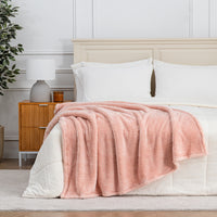 Premium Extra-Fluffy™ Throw in Country Lane draped across the foot of a bed