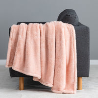 Premium Extra-Fluffy™ Throw in Country Lane draped over the arm of a gray sofa, close view