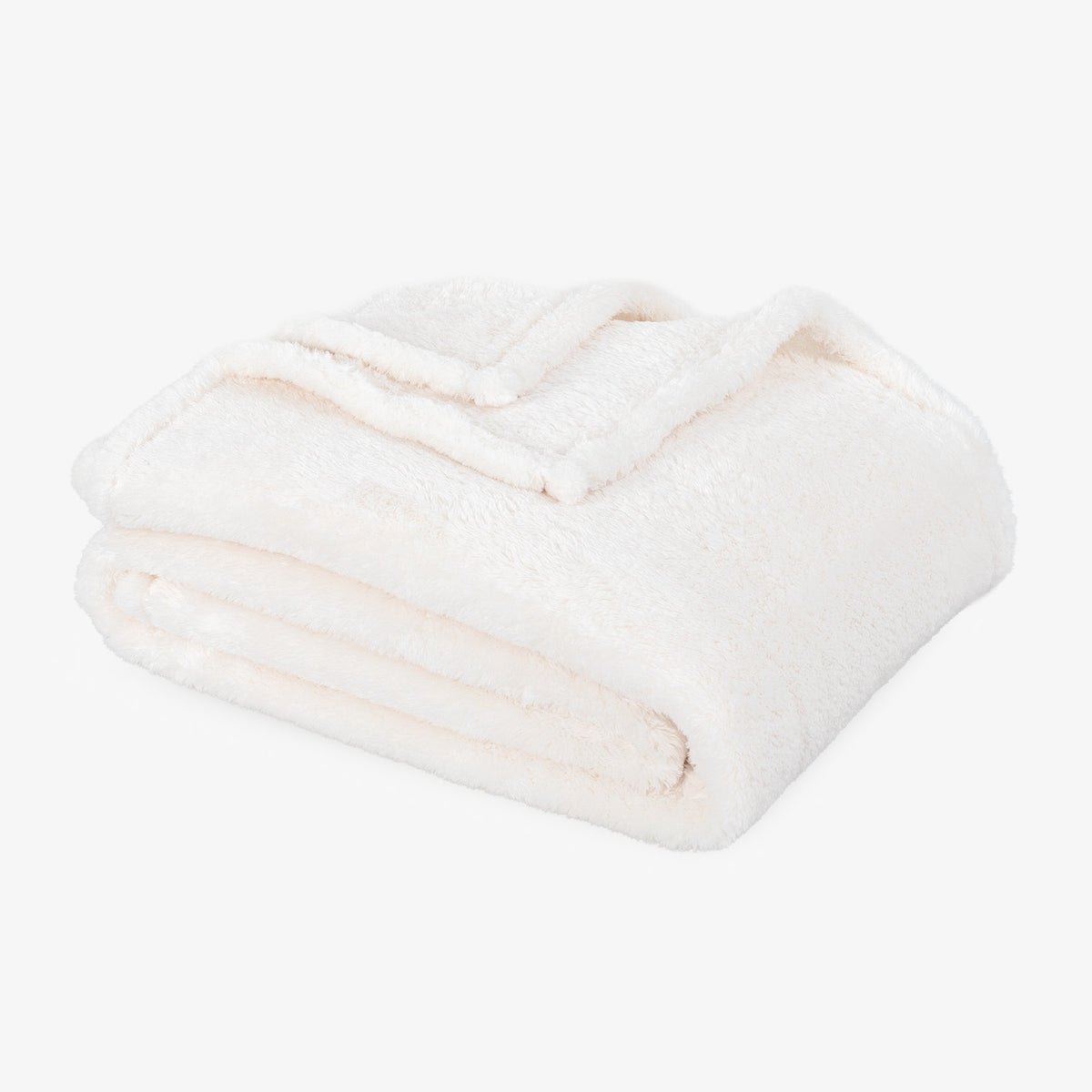Premium Extra-Fluffy™ Throw in Cream, folded on a white background
