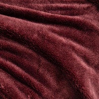 Close-up of Premium Extra-Fluffy™ high-pile plush in Deep Fig