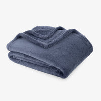 Premium Extra-Fluffy™ Throw in Galaxy Blue, folded on a white background