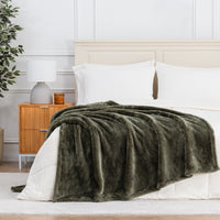 Premium Extra-Fluffy™ Throw in Ivy draped across the foot of a bed