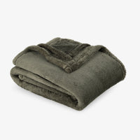 Premium Extra-Fluffy™ Throw in Ivy, folded on a white background