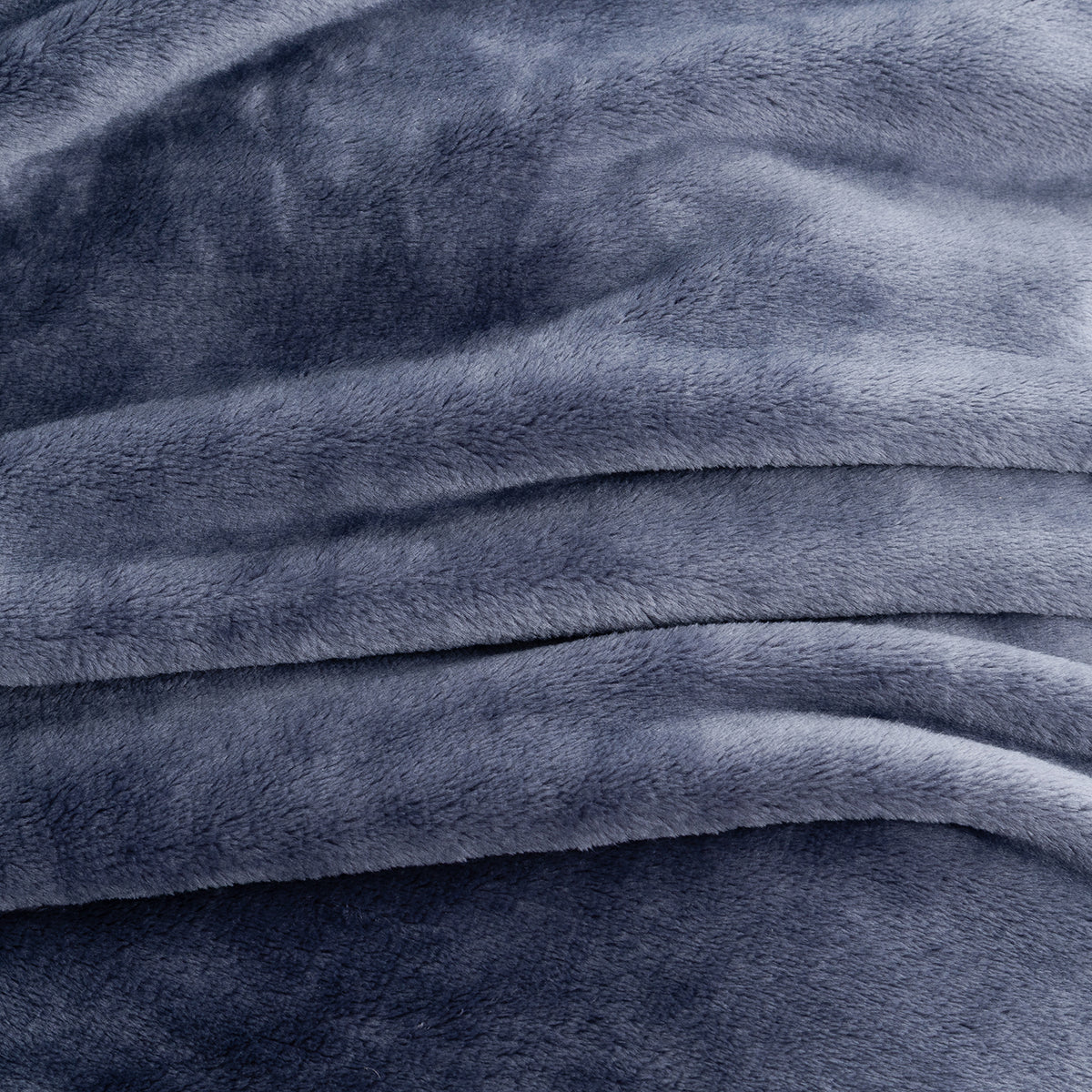 A close-up of plush, soft fabric in a muted slate blue-gray color, showing the texture and folds of the material.