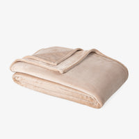 Premium VelvetLoft® Blanket in Hummus, folded on a white background