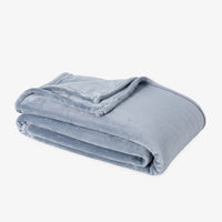 Premium VelvetLoft® Blanket in Polar Blue, folded on a white background